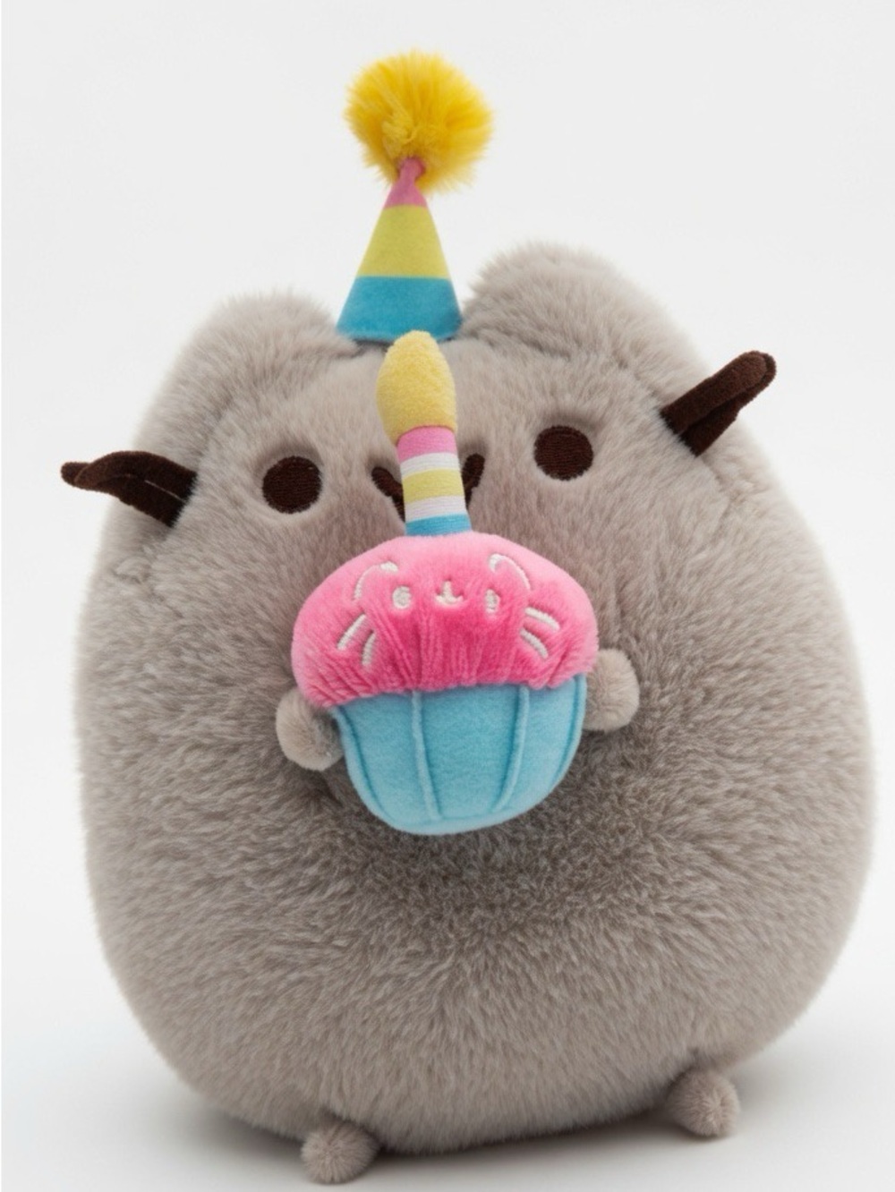 Pusheen Plush Tag on Soft Light Gray Fabric